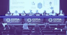 CCPSA commissioners at table seated in front of auditorium. the image is tinted blue and has a thin blue line motif across the front