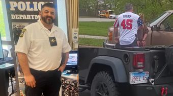 middle aged man with gray hair in white police uniform shirt, in trump jersey with number 45 on back, and back of black Jeep with license plate 45