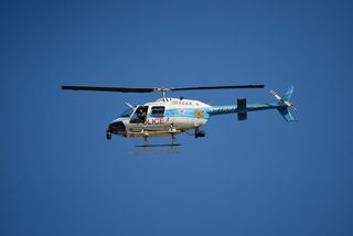 CPD helicopter in blue sky